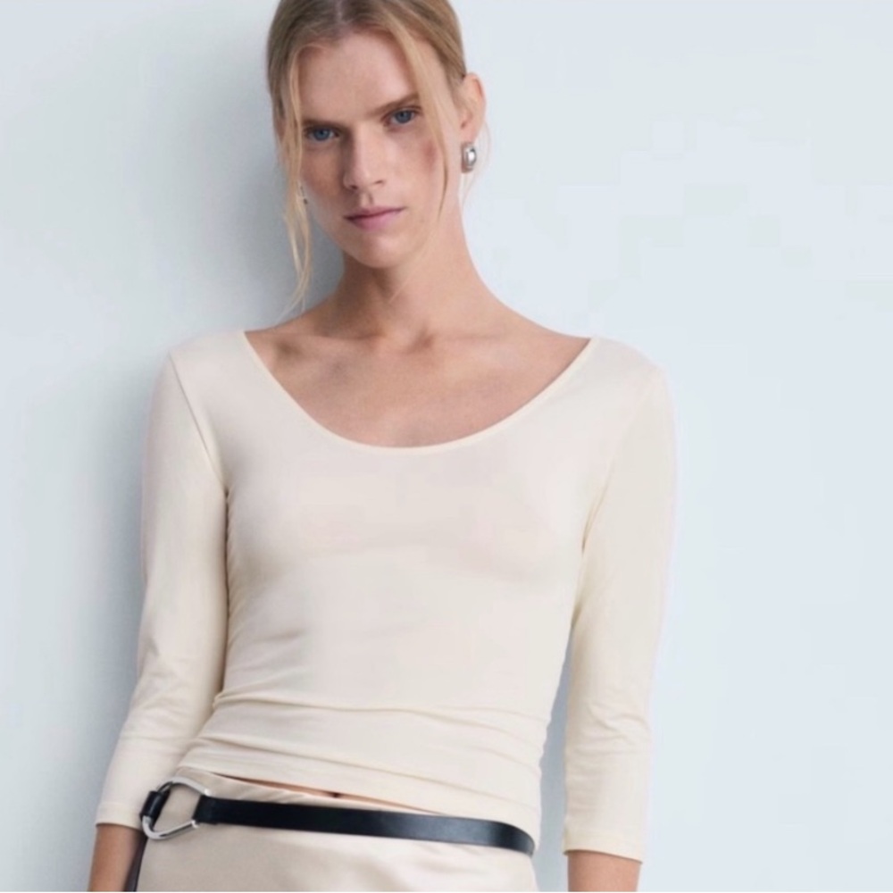 Mango Women's Ivory Top. Sz fits M/L; Mango tag is XL. Stretch Very slim fit.